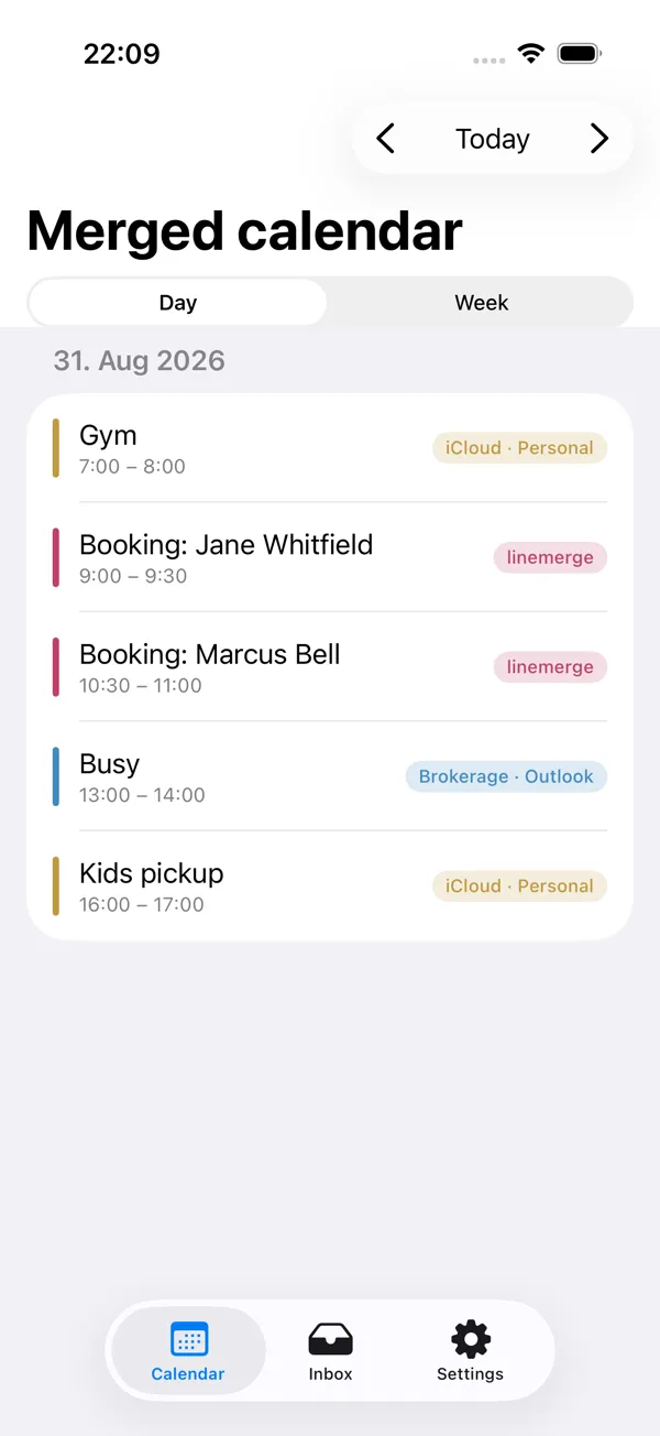 The iOS app day view with busy blocks from a paired phone calendar